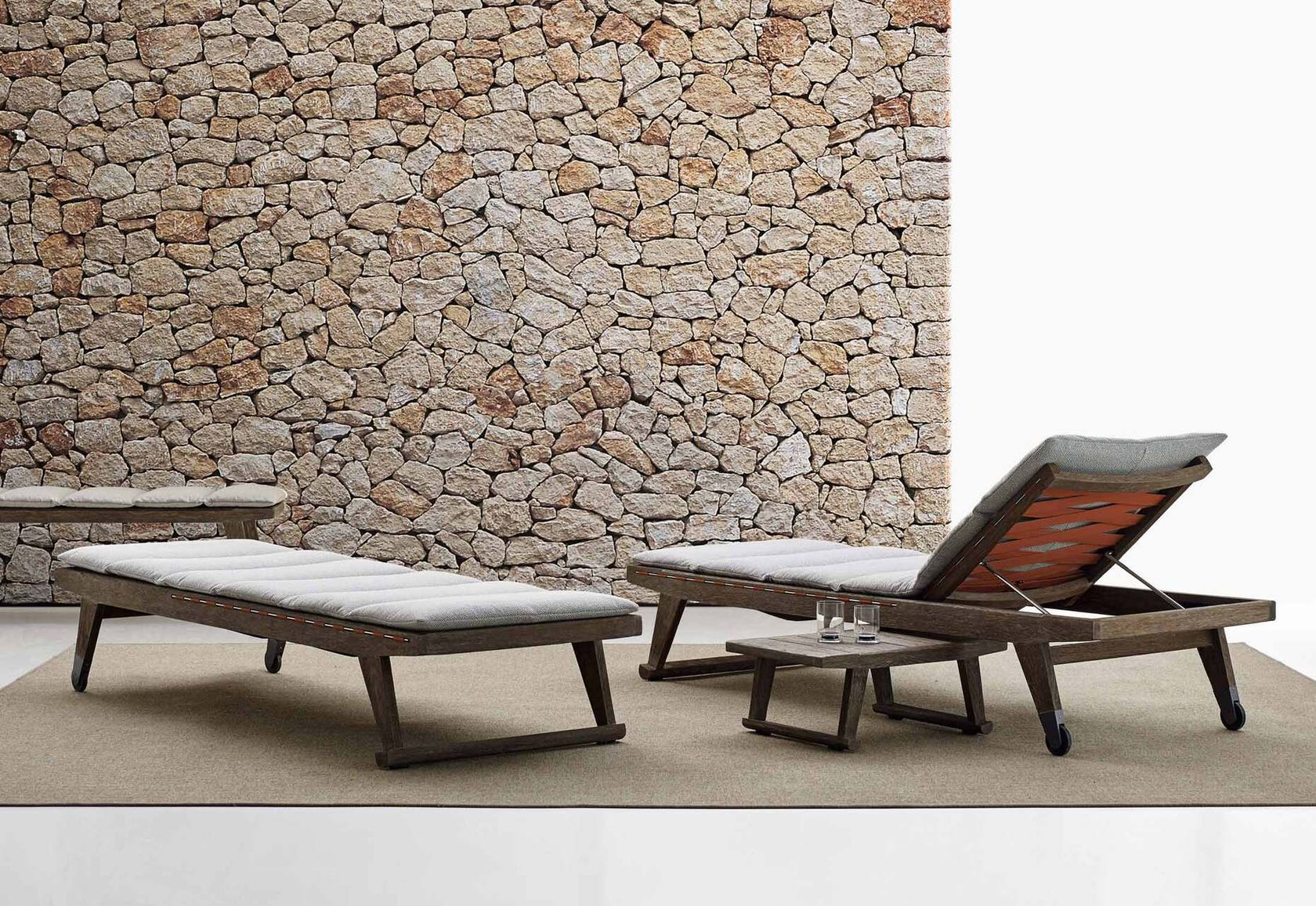 B&B Italia Gio outdoor seating in solid teak with polypropylene ribbon interlacing