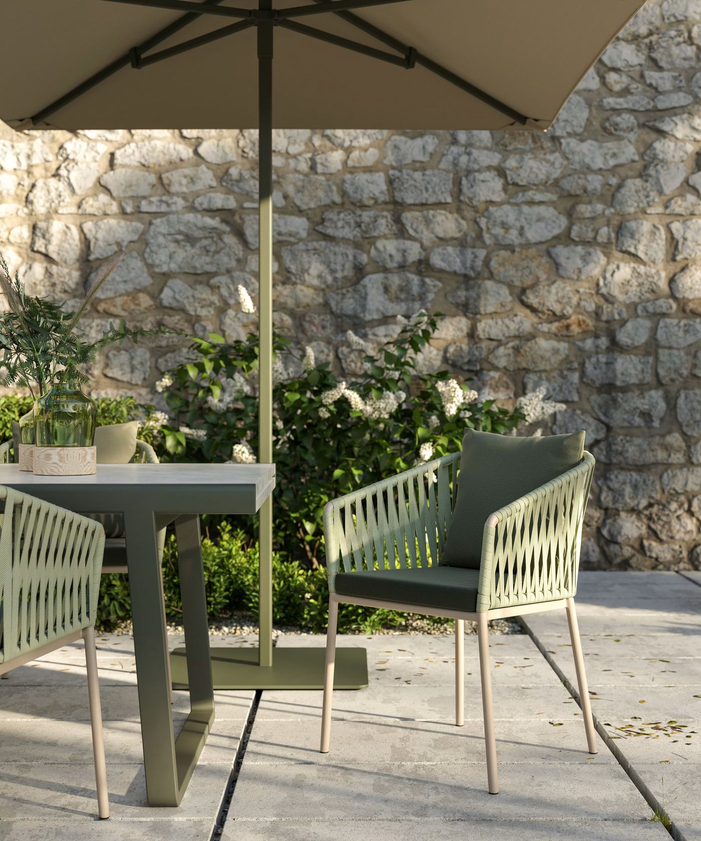 Kettal Bitta outdoor seating by Rodolfo Dordoni, aluminium frame with braided polyester rope on a terrace